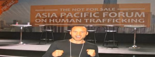 Cameron Conaway on stage at The Not For Sale Asia Pacific Forum on Human Trafficking, 2012